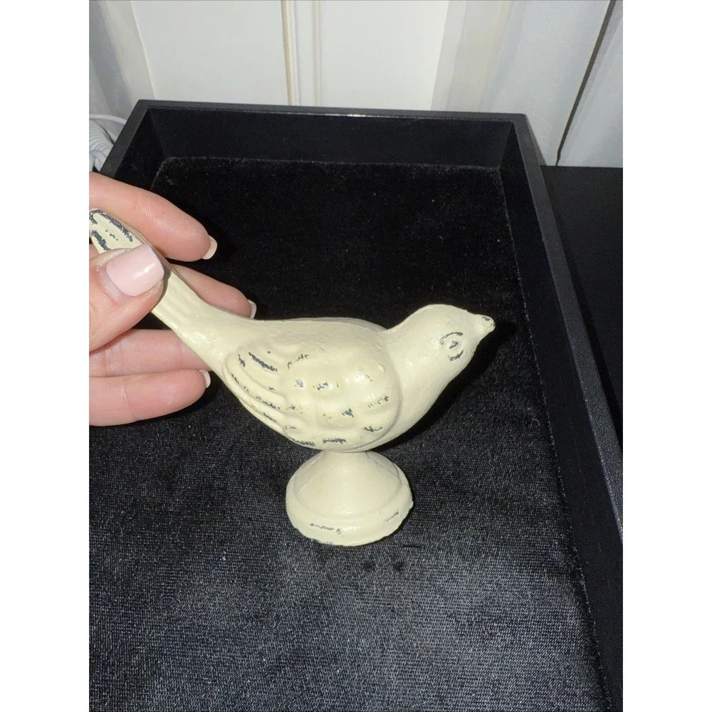 cast metal bird painted white. Heavy.‎ 3885